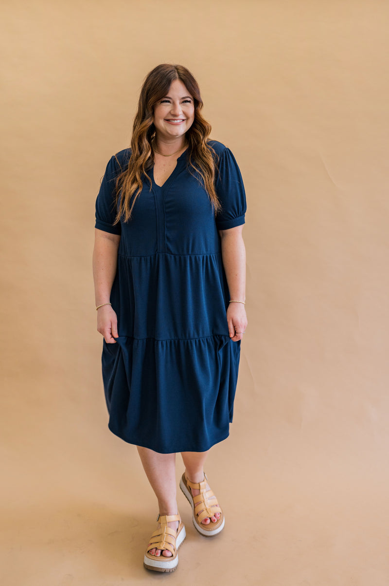 Navy dress with puffed sleeves. Navy dress styled with sandals and minimal jewelry for the perfect spring dress.