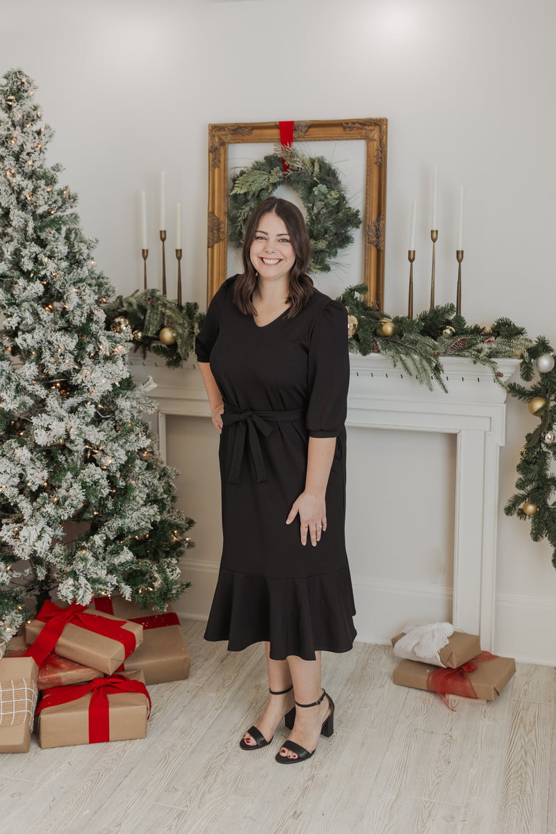 Model wearing Holiday Black Ribbed Modest Dress