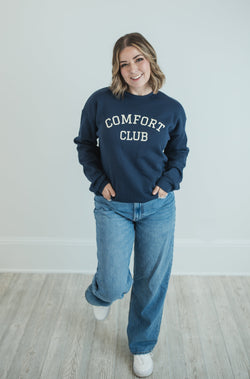 Comfort Club Graphic Navy Sweatshirt on Size Medium Model