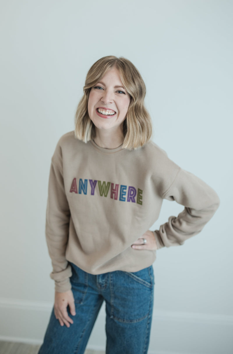 Close View of Tan Anywhere Sweatshirt in Mutilcolor Screen Print Text