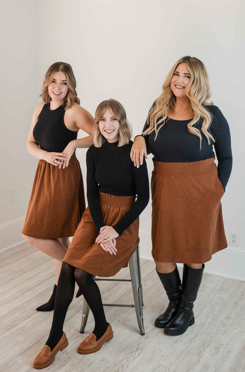 Group Photo of Models in Knee Length Corduroy Skirt In Brown
