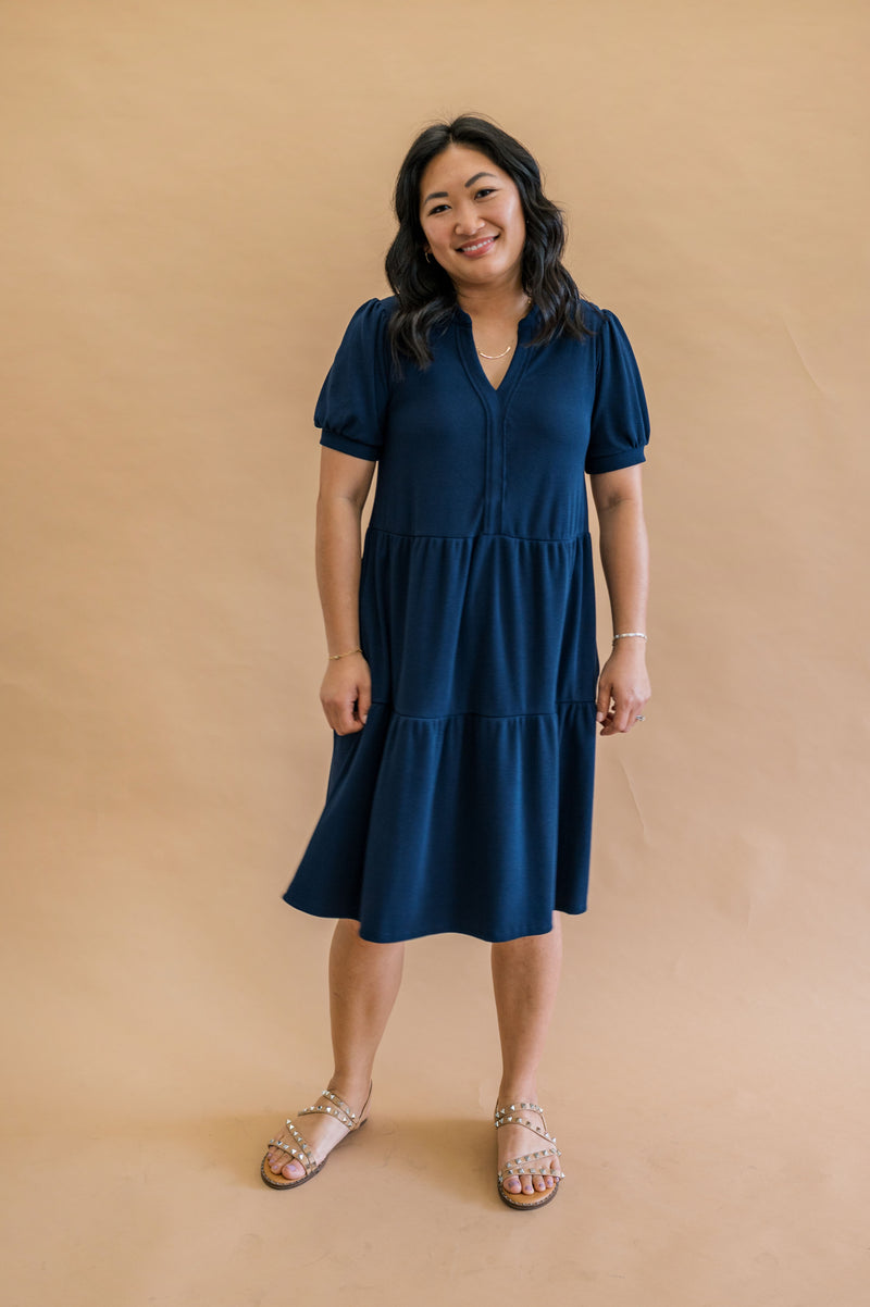 Navy Ribbon tiered modest dress with puffed sleeves and relaxed fit. 