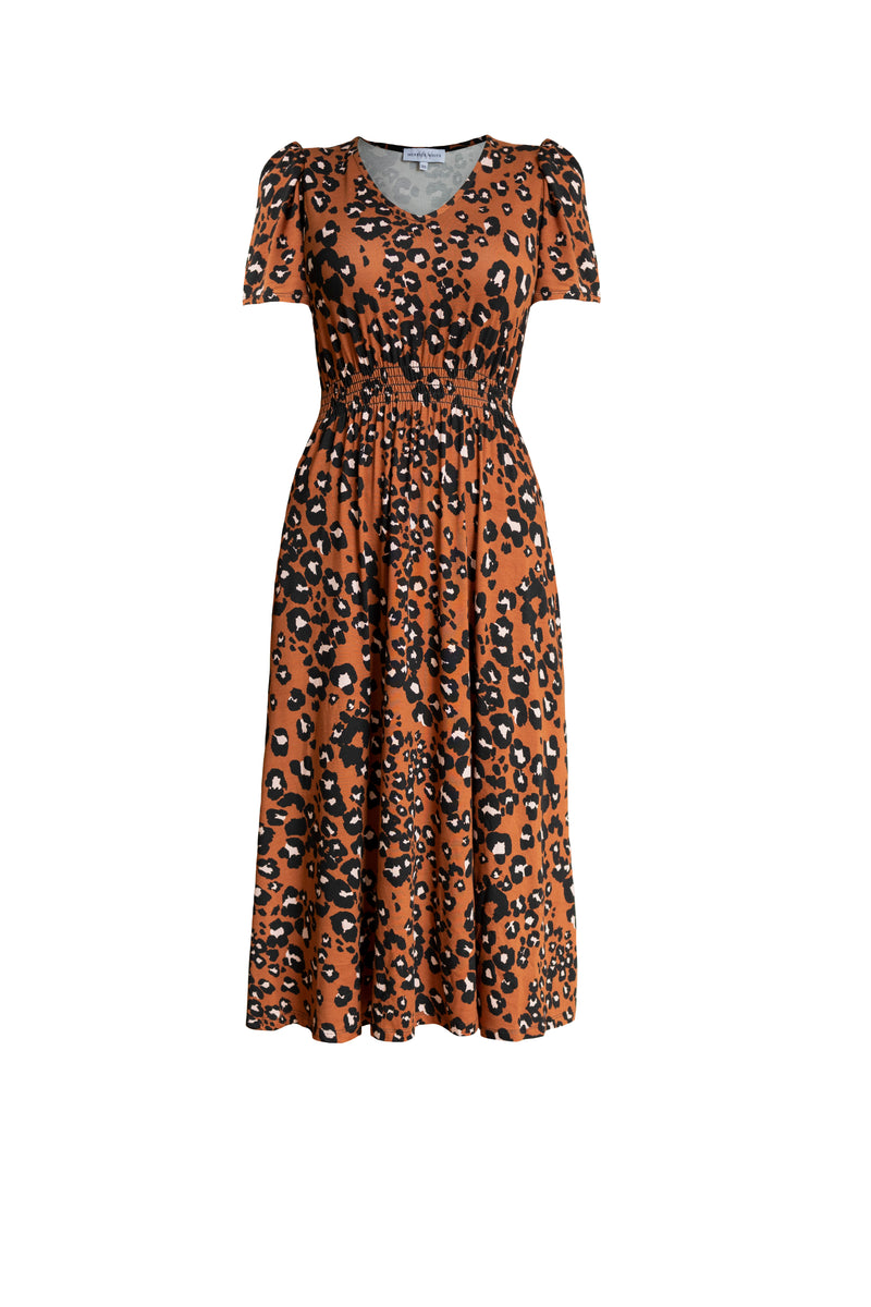 Animal Print Midi Anywhere Dresses - Product shot.Dress is midi length in brown with white and black animal spots.